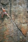 About midway up the diagonal crack