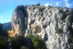 Jen climbs a warmup route at a hidden crag near Ya�n