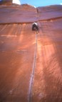 Higher up, the crack turns to tight hands
