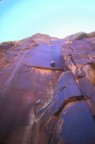 Mioara follows Supercrack, one of the more well-known climbs at Indian Creek