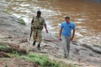 Chris and Corporal Bulge look around for a suitable place to camp�preferable not next to the river where all the big game are